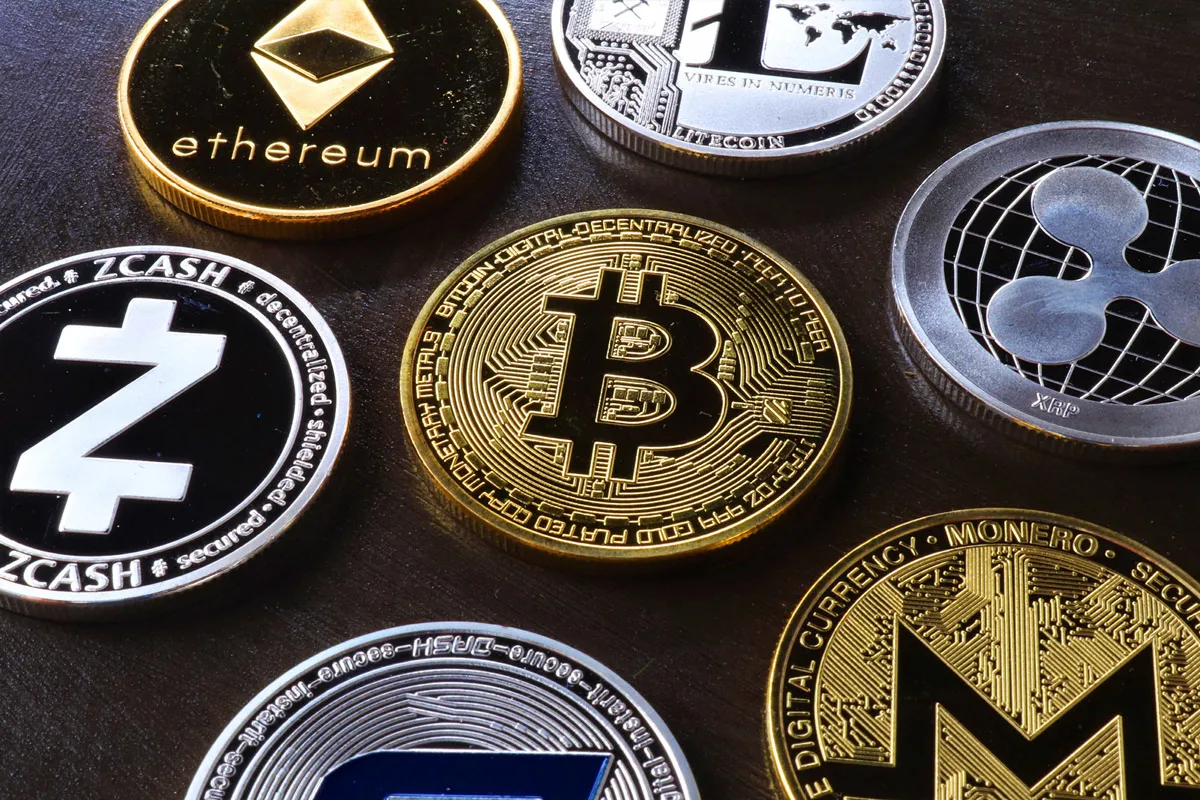 Decoding-Cryptocurrencies-613534-various-cryptocurrency-on-table
