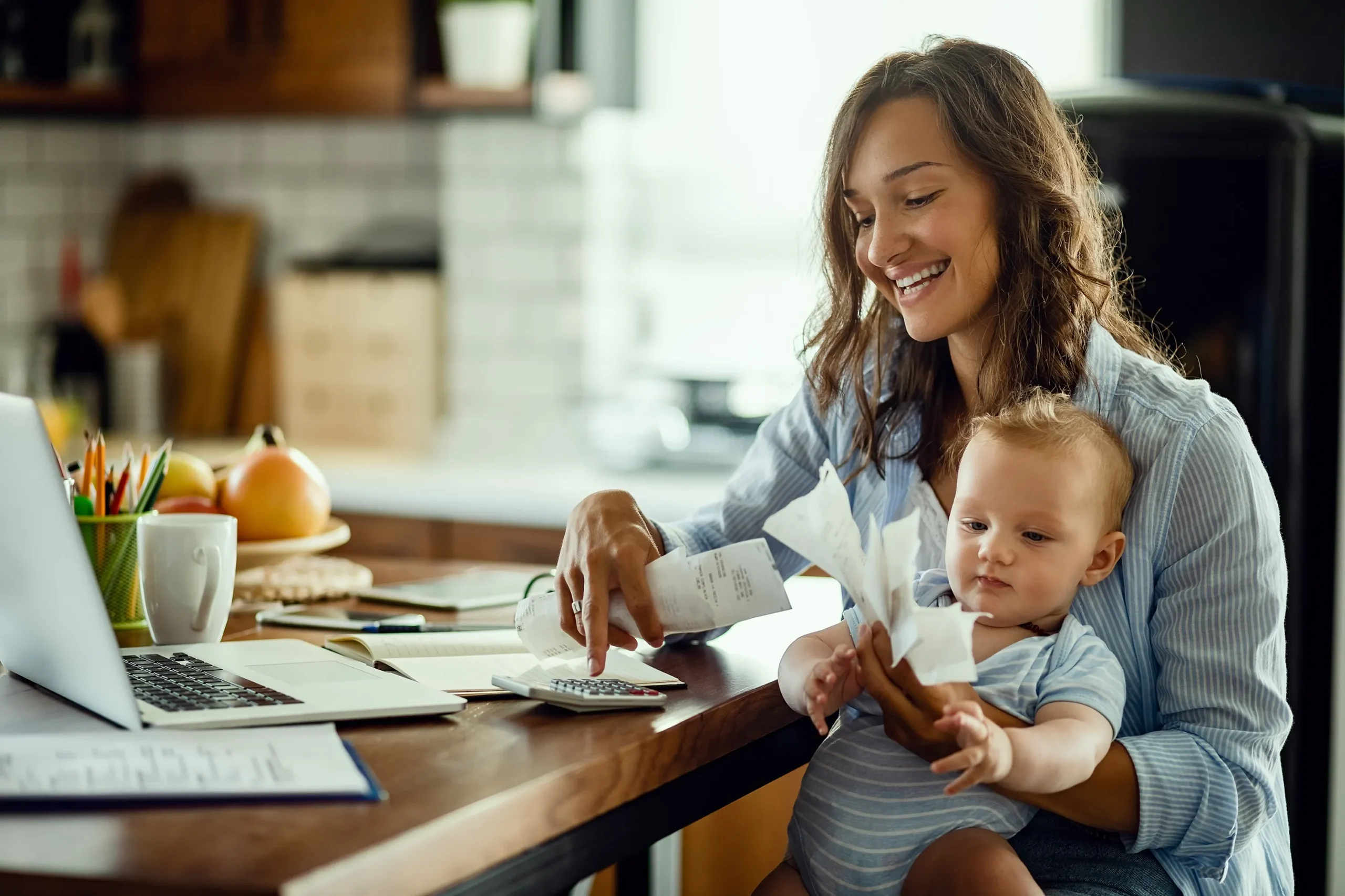 young-working-mother-with-baby