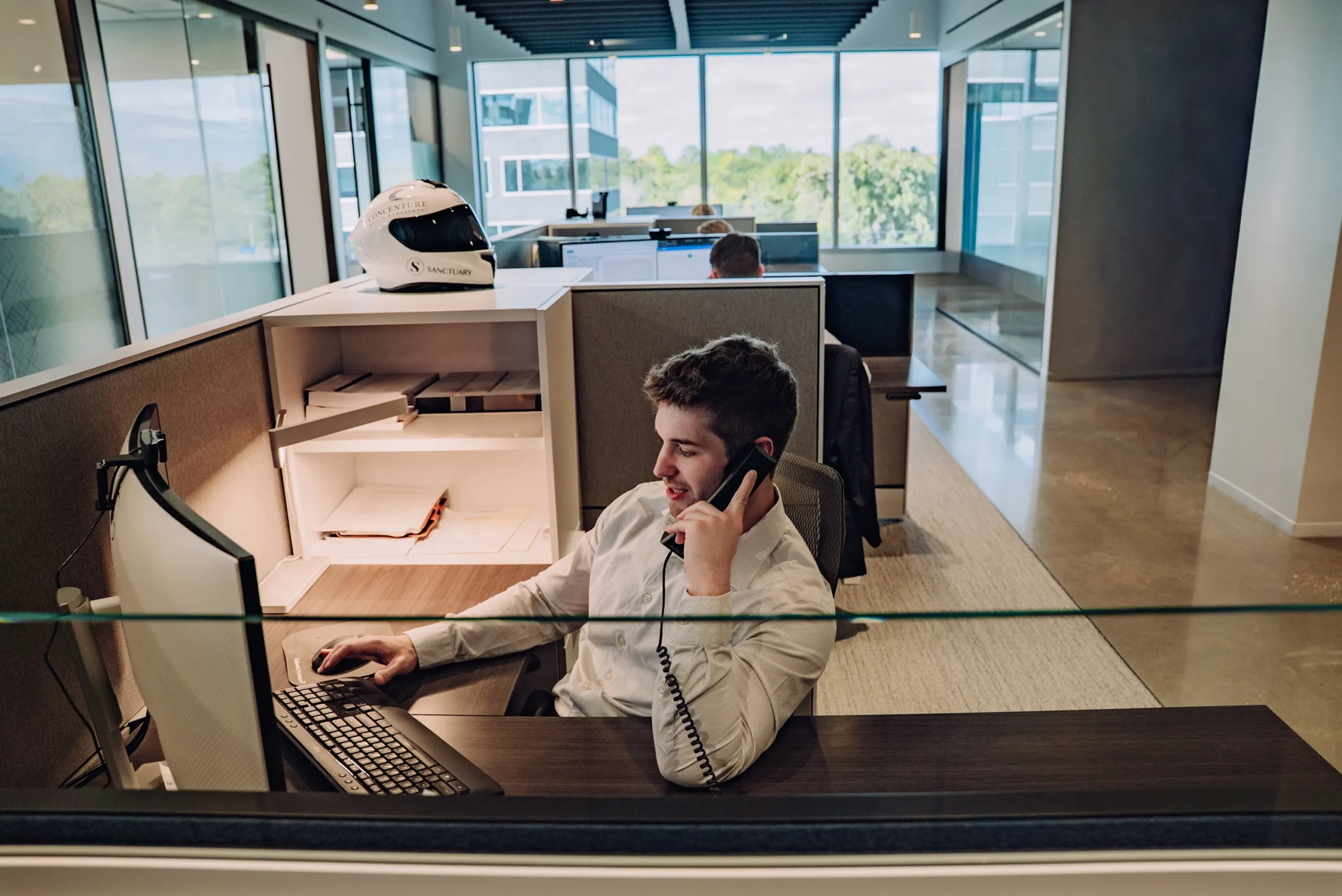 Investment management professional monitoring portfolios and providing proactive client support